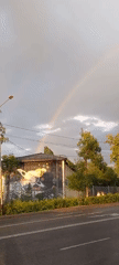 Rainbow over Almaty streets, July 2026