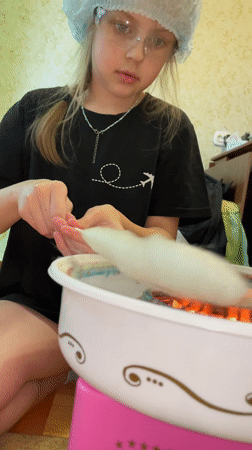 Girl and rabbit spotted in Izhevsk indoor setting