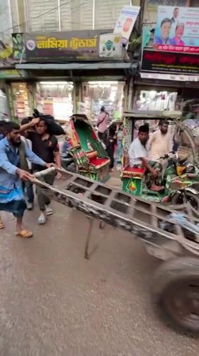 Busy street scenes and vendor activity in central Dhaka