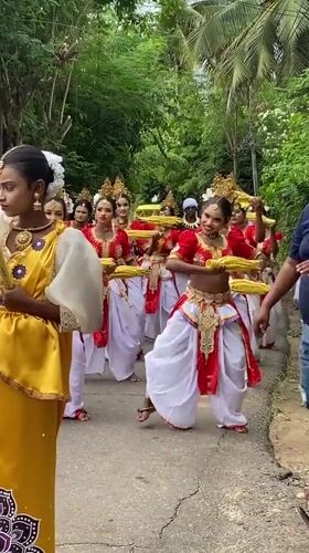 Traditional cultural procession winds through Hikkaduwa with dancers and elephant
