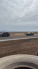 Two cars race on closed track in Arica
