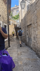 Morning street life documented in Budva's historic district