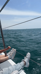 Boat journey recorded off Herzliya coast with city skyline