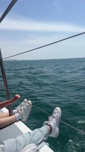 Boat journey recorded off Herzliya coast with city skyline