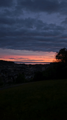 Dramatic sunset captured over St. Gallen cityscape and countryside