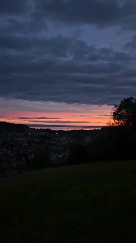 Dramatic sunset captured over St. Gallen cityscape and countryside