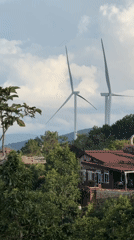 Wind turbines spotted operating in rural Phát Chi, Vietnam