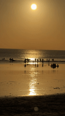 Sunset session at Kuta Beach: drinks, shopping, and shoreline crowds