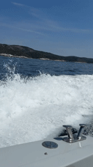Boat moving through the Adriatic off the Croatian coast