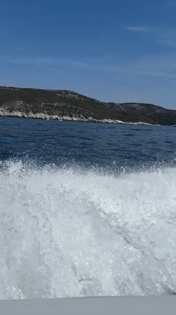 Boat moving through the Adriatic off the Croatian coast