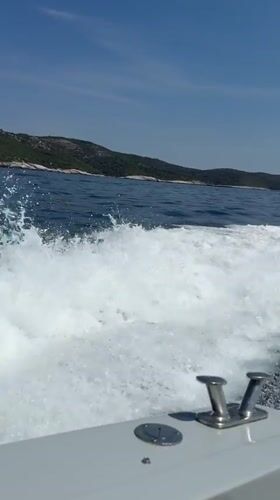 Boat moving through the Adriatic off the Croatian coast