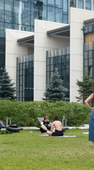 Outdoor yoga session held among Moscow skyscrapers