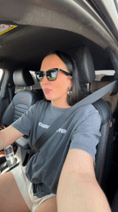 Woman drives car in Noviy, Russia