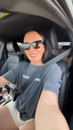 Woman drives car in Noviy, Russia