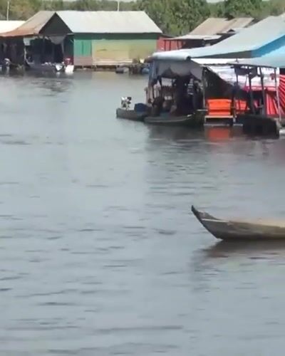 Floating village life documented in Cambodia waterways