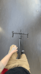 Cyclist rides paved road in Olivos, Argentina
