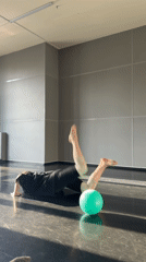 Woman performs gymnastics in sunlit Saint Petersburg room