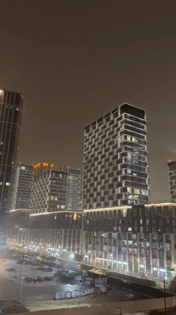 Nighttime illuminated high-rises captured in Khimki, Russia