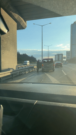 Person stands by damaged van on Turkish highway