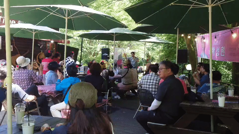 Early morning outdoor gathering with music at Daejeon forest cafe