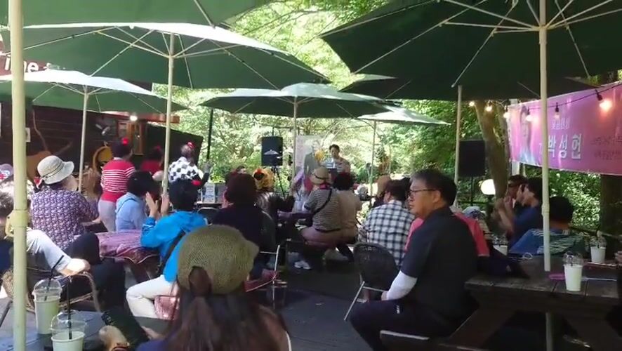Early morning outdoor gathering with music at Daejeon forest cafe