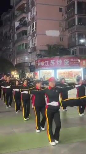 Evening group exercise routines observed across Jiangjin commercial district