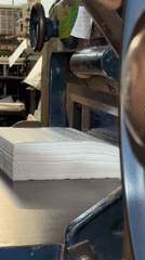 Barcelona resident documents printing equipment, holds vintage Coolio CD