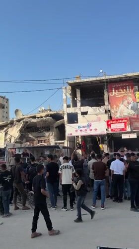 Crowds gather amid destruction in Gaza City