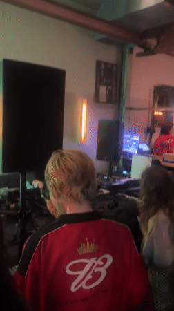 DJ performs for small crowd at evening event in The Hague
