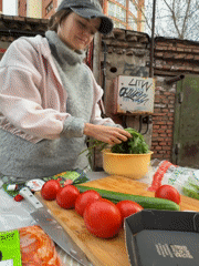 Outdoor barbecue gathering documented in Krasnoyarsk with food preparation