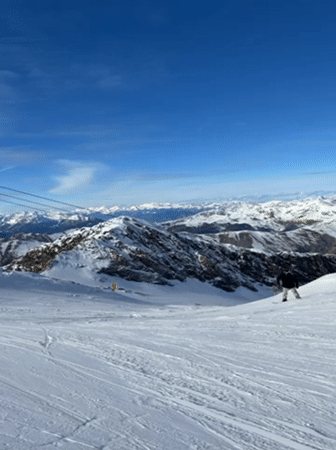 Skier enjoys sunny Alpine slopes in Austrian mountains