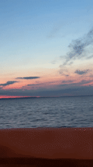 Sunset observed over water in Chaikovsky, Russia