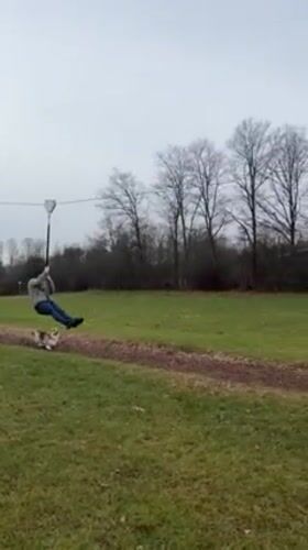 Zipline rider and merry-go-round family enjoy outdoor recreation