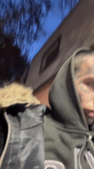 Tattooed man recorded on Buenos Aires street during evening