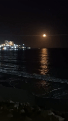 Moonlit beach scene captured in Pampatar, Venezuela