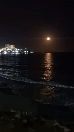 Moonlit beach scene captured in Pampatar, Venezuela