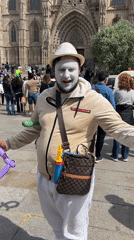 Ordinary street life documented across Barcelona plaza area