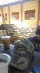Morning at a Lhokseumawe computer lab, with work happening outside too