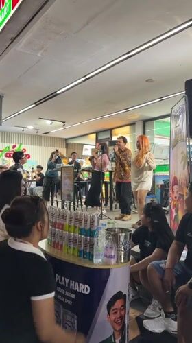 Live band performs outside 7-Eleven in Kuta, Indonesia