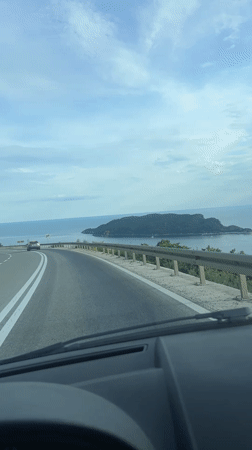 Driver records coastal road journey in Budva, Montenegro