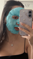 Woman takes selfies in athletic wear in Saint Petersburg