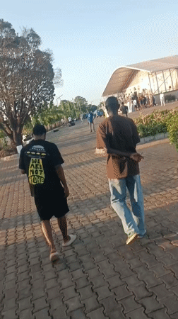 Community event features games, merchandise, gathering in Nigerian tent venue