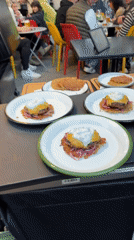 Evening dining scene observed at Tel-Aviv outdoor cafe