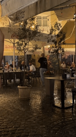 Heavy rain soaks outdoor cafes in Plovdiv's historic district
