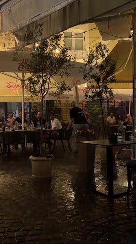 Heavy rain soaks outdoor cafes in Plovdiv's historic district