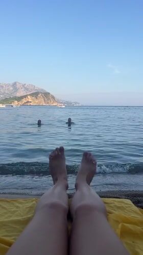 A lazy beach afternoon fades into sunset on the Budva coast