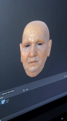 3D head model transitions from colorful to realistic on laptop