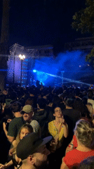 Young crowds gather for nighttime concert in central Buenos Aires
