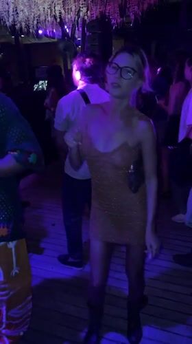 Woman in sparkly dress documented at North Kuta party venues