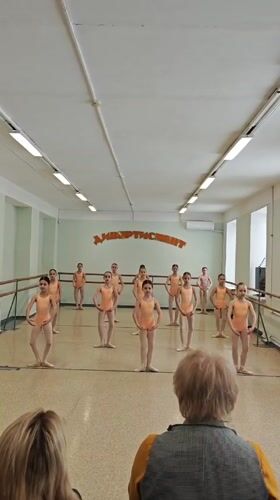 Young dancers practice ballet in Russian studio